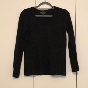 Black V-neck sweater